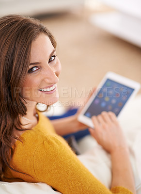 Buy stock photo Happy, woman and portrait with tablet on sofa reading ebook on app to relax on holiday or vacation in home. Girl, smile and lounge on tech with blog, article or news from search on internet in house