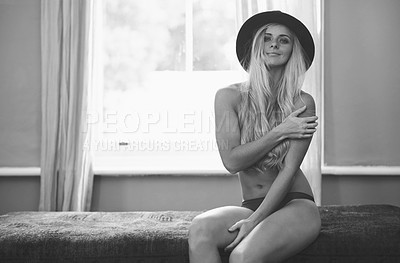 Buy stock photo Portrait, monochrome art and naked woman in bedroom of home to relax in morning for feminine wellness. Sexy, smile and underwear with happy or confident nude model in black and white for seduction