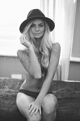 Buy stock photo Portrait, naked and body of woman in bedroom at home for beauty, hair or sexy aesthetic of skin in Switzerland. Nude, bed and topless female person in hat, underwear and confidence in black and white