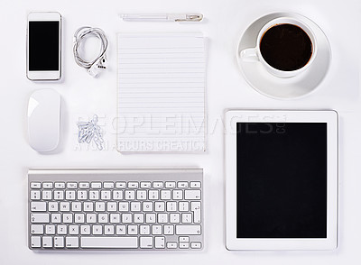 Buy stock photo A high angle view of various office equipment items and digital devices