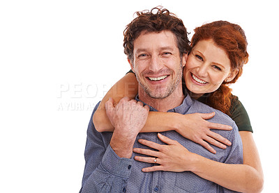 Buy stock photo Studio portrait of a beautiful couple being affectionate