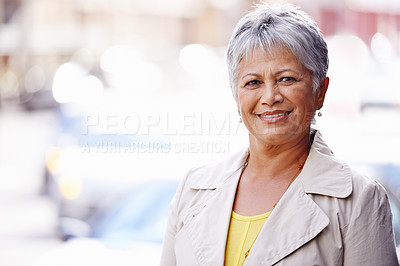 Buy stock photo Portrait of a mature woman spending a day in the city