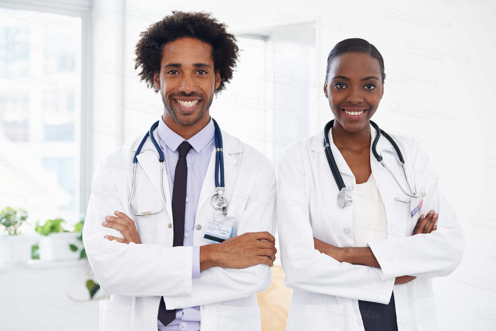 Buy stock photo Black people, portrait and doctors with arms crossed for health, confidence in medicine and team at hospital. Cardiovascular surgeon, healthcare and medical professional collaboration with pride