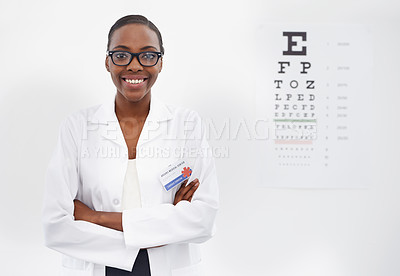 Buy stock photo Test, vision and portrait of woman in consultation for optometry, eye exam and doctor in healthcare. Glasses, expert and medical chart with letters in clinic and African optometrist with spectacles