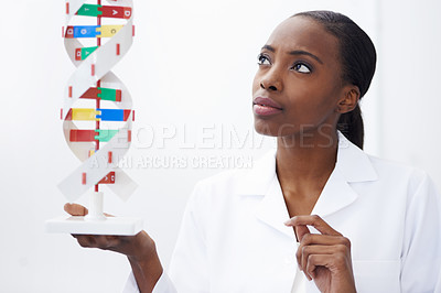 Buy stock photo Science, woman and dna model in laboratory with molecule genetics, biological diagnostics and organism development. Scientist, african professional and thinking of helix particles for medical study
