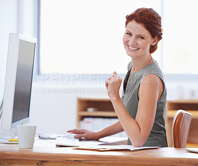 Buy stock photo Portrait of an attractive young businesswoman working at her desk