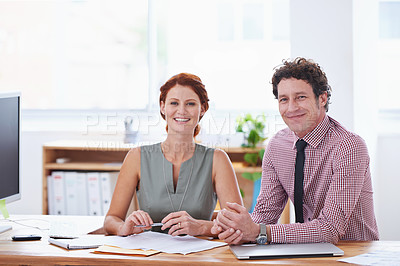 Buy stock photo Business people, teamwork and planning at office desk for support and collaboration with financial documents. Professional accountant, advisor or man and woman with paperwork, face or happy portrait