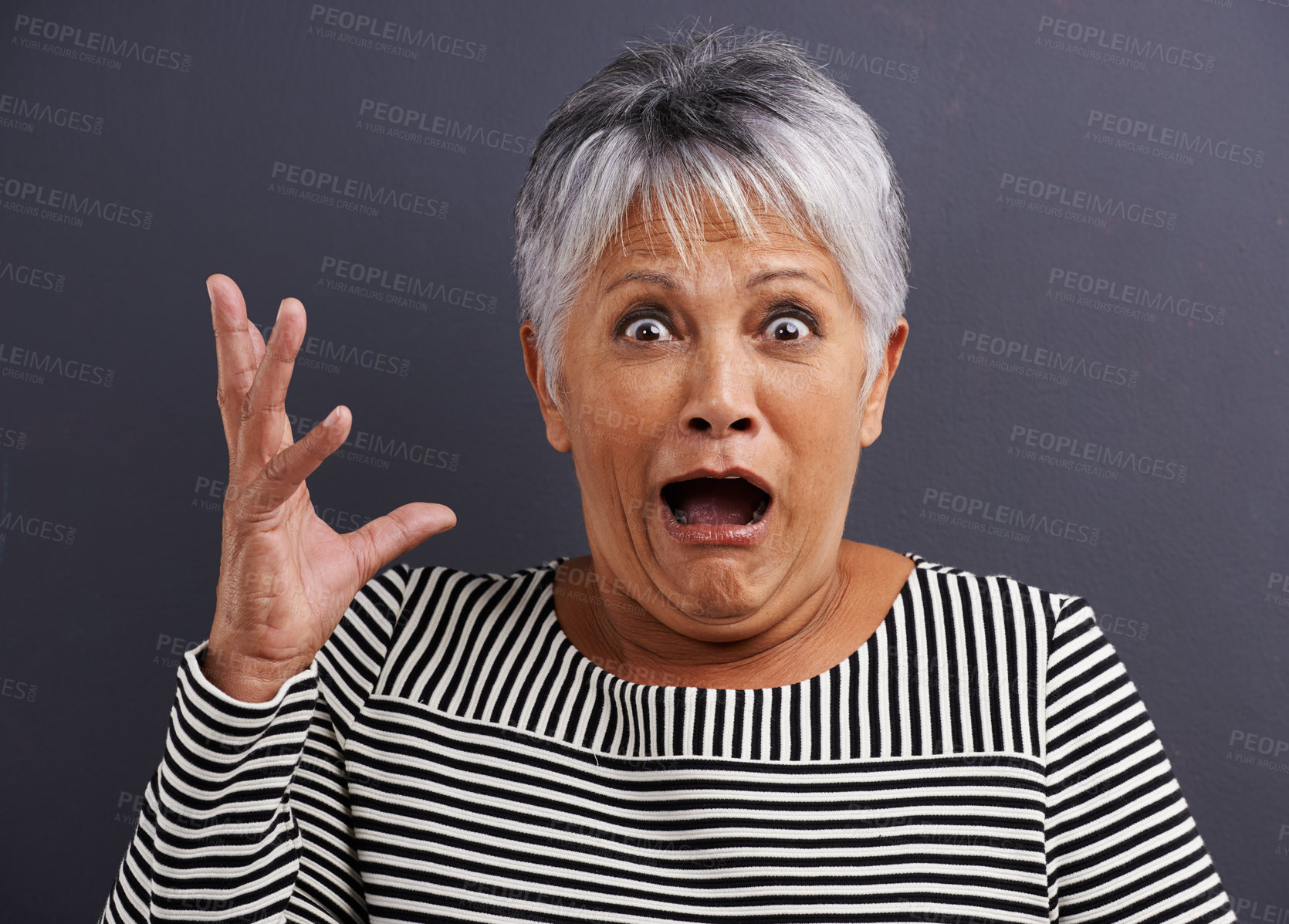 Buy stock photo Shock, portrait and senior woman in studio with fear, scared and terror facial expression. Surprise, crazy and elderly female person with terrified or horror face isolated by black background.