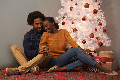 Buy stock photo Christmas, tree and black couple in home with love on holiday or hug on vacation with happiness. Festive, house and people embrace with care and support or excited to celebrate at event together