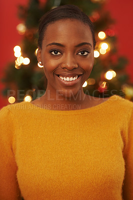 Buy stock photo Christmas, tree and portrait of black woman in home on holiday or festive vacation with happiness. African, girl and smile on xmas with excited energy and lights to glow in living room of house 