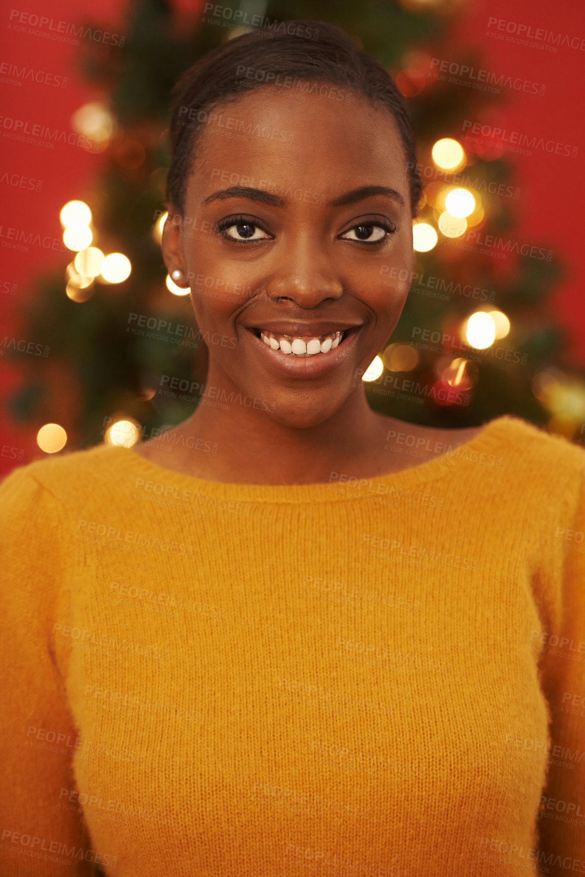 Buy stock photo Christmas, tree and portrait of black woman in home on holiday or festive vacation with happiness. African, girl and smile on xmas with excited energy and lights to glow in living room of house 