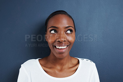 Buy stock photo Thinking, idea and happy black woman in studio with solution, insight or conclusion on blue background. Planning, problem solving and African female model with curious emoji for inspiration or memory