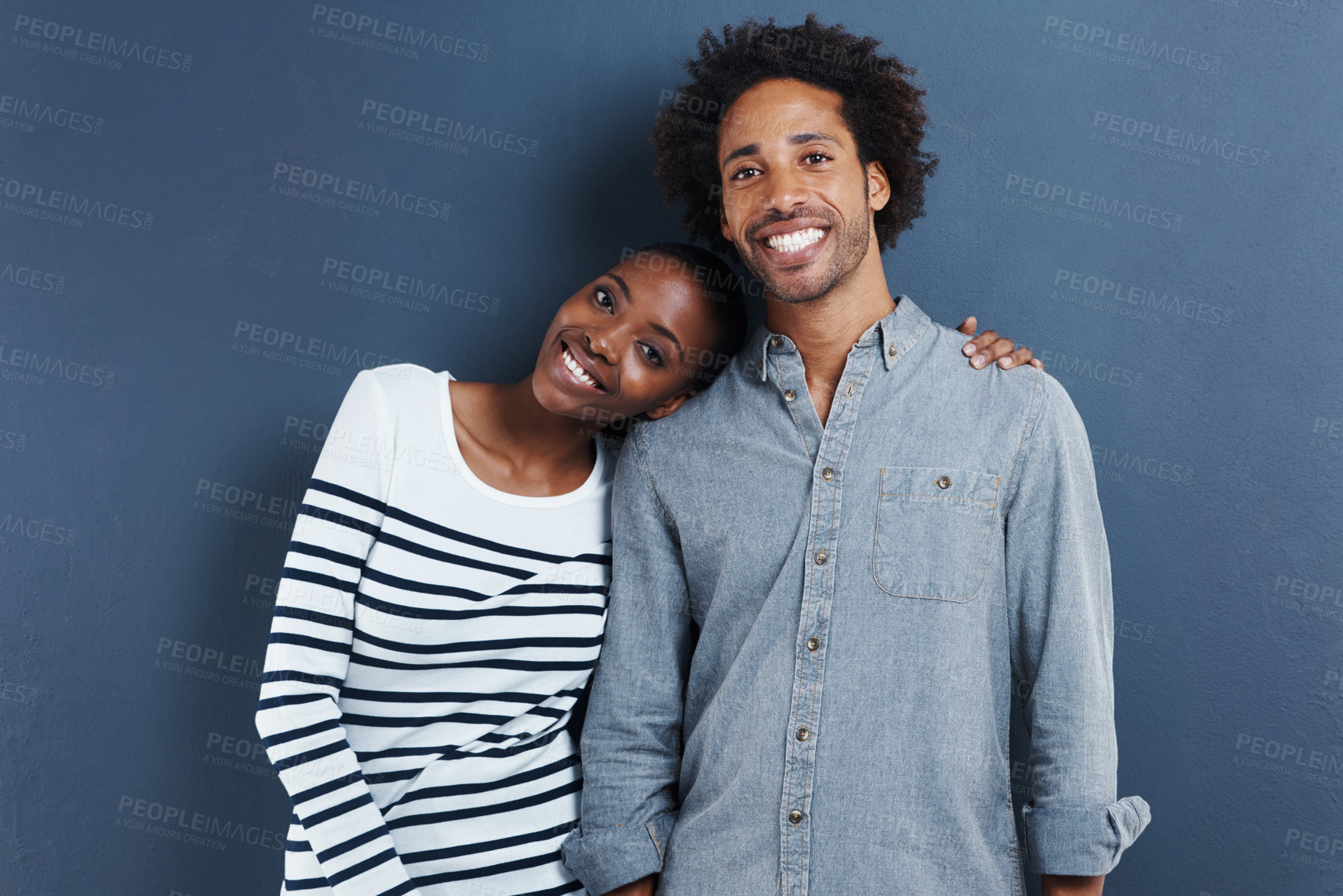 Buy stock photo Happy, portrait and black couple hug with love on studio background together with cool fashion. African, people and smile in embrace for profile picture with casual style and clothes on mockup space
