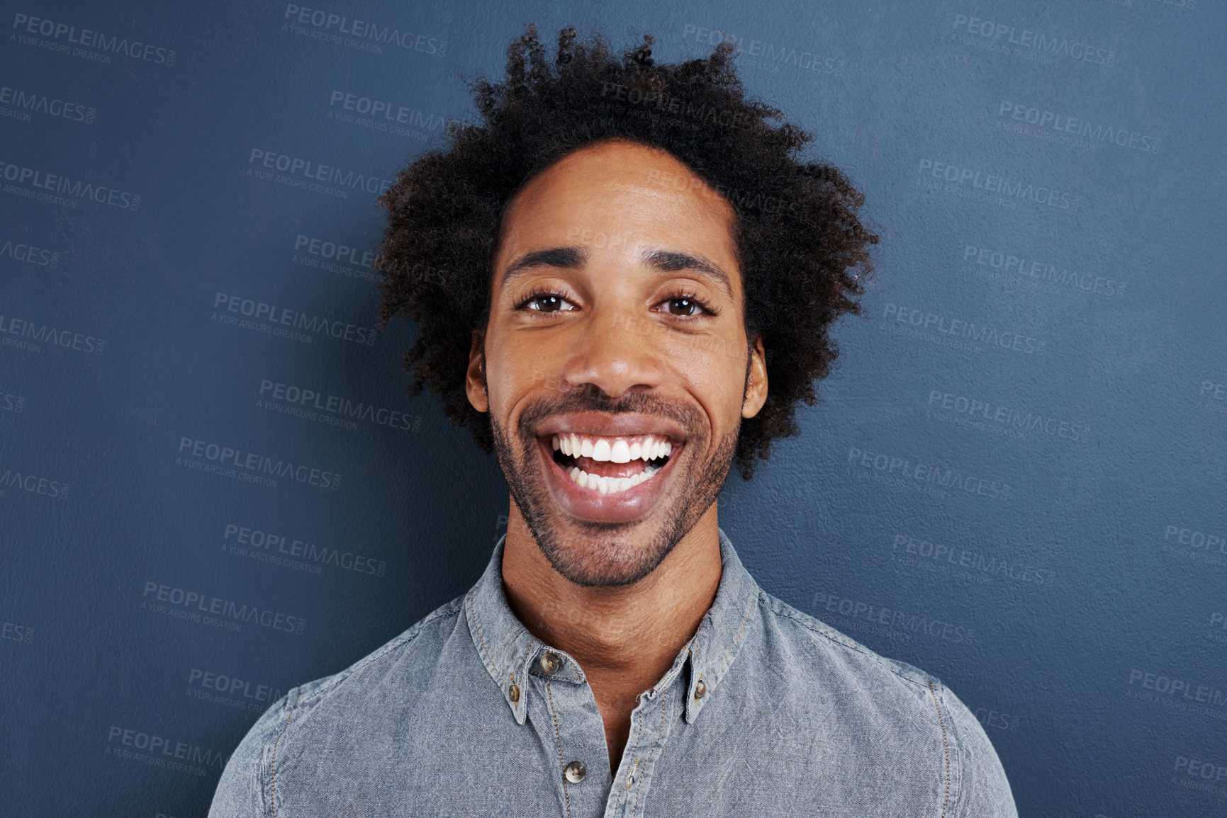 Buy stock photo Portrait, smile and black man with fashion, happiness and confident guy on a grey studio background. Face, African person and model with a shirt and cheerful with mockup space and afro with style