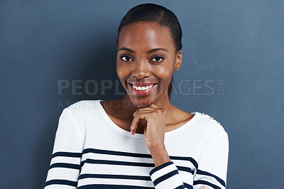Buy stock photo Black woman, portrait and casual for fashion with smile, calm and cool in studio with stripe shirt isolated on blue background. Happy African model, pride and posing with stylish and simple clothes