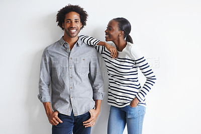 Buy stock photo Couple, hug and portrait by white wall in fashion with confidence, casual style and model aesthetic. Black woman, and face of man with trendy apparel, edgy clothes and happiness with relax or romance