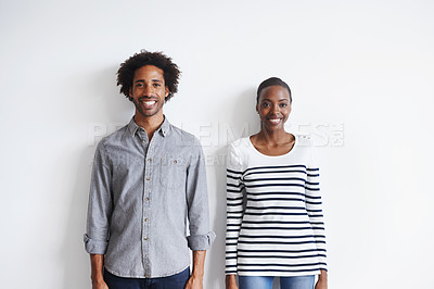 Buy stock photo Couple, smile and portrait by white wall in fashion with confidence, casual style and model aesthetic. Black woman, and face of man with trendy apparel, edgy clothes and pride with happiness or relax