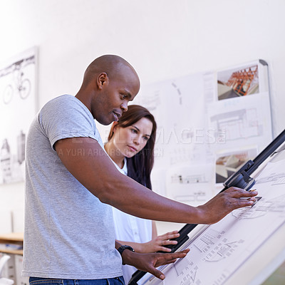 Buy stock photo Architecture, man and woman with blueprint on drawing board in office for building design and remodeling project. Business people, collaboration or happy architect with development planning or layout
