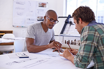 Buy stock photo Architecture, men and teamwork with drawing on blueprint in office for building design, remodeling project and floor plan. Business people, collaboration or architect with construction development