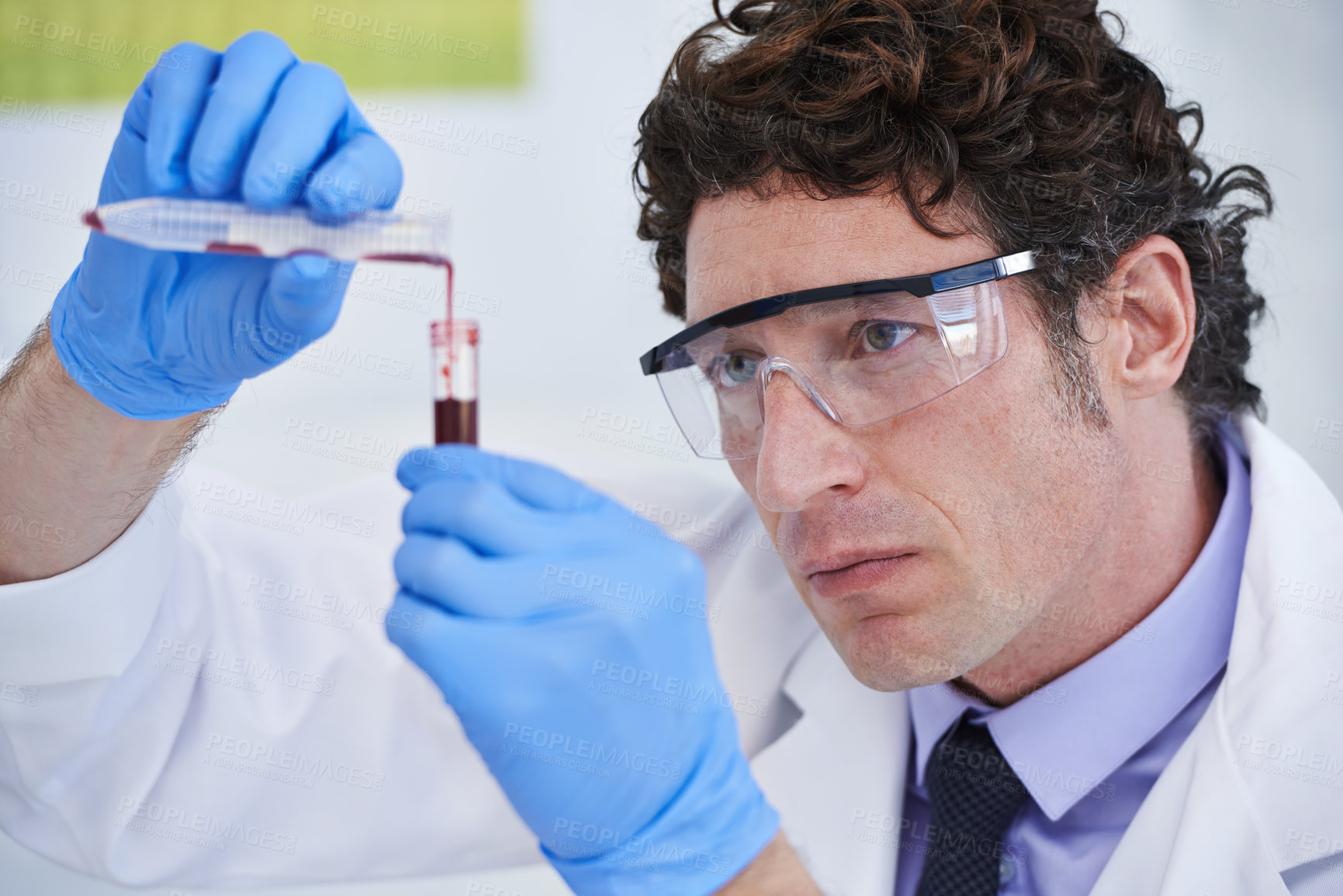 Buy stock photo Science, study and man with blood in test tube for biotech engineering, pathology and analysis. Laboratory, investigation and scientist checking DNA sample for medical research in vaccine development