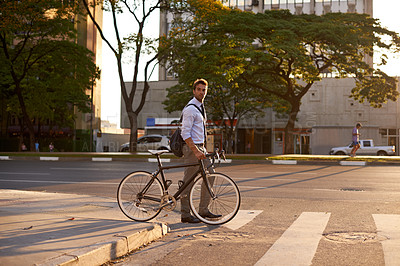 Buy stock photo Crosswalk, bike and business man in city for morning, sustainable travel and carbon footprint. Cycling, transportation and urban with employee walking on commute for journey, transit and professional