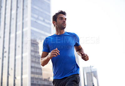 Buy stock photo Fitness, city and male athlete running for health, wellness or training for a marathon, competition or race. Sports, runner and man doing outdoor cardio exercise for endurance or speed in urban town.