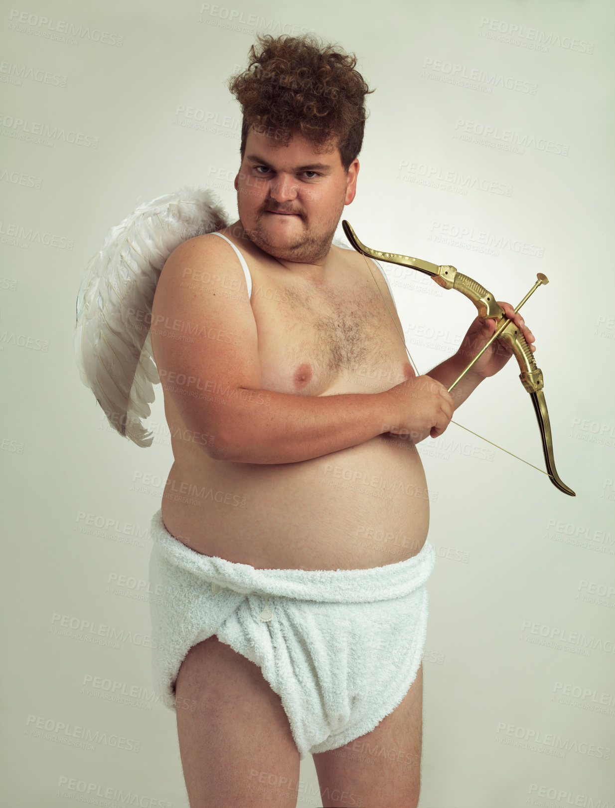 Buy stock photo An obese man dressed as a cherub while  isolated