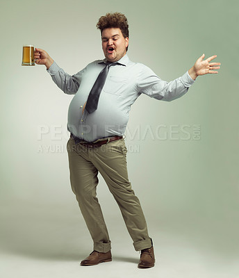 Buy stock photo Man, beer and proud with belly for celebration, drink or party on a studio background. Male person or plus size model with glass or mug in satisfaction for beverage, wine or drinking on mockup space