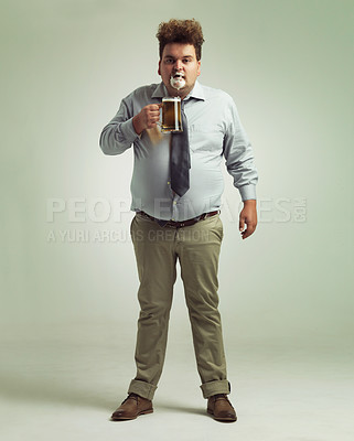 Buy stock photo Man, portrait and face with beer foam, drink or party in obesity on a studio background. Male person or plus size model with glass, mug or alcohol in satisfaction for wine or booze on mockup space