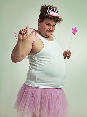 Buy stock photo Shot of an obese man wearing a fairy costume