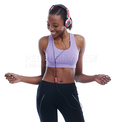 Buy stock photo Fitness, music and smile with happy black woman in studio isolated on white background for radio. Exercise, dance and headphones with confident young sports model training for health or wellness