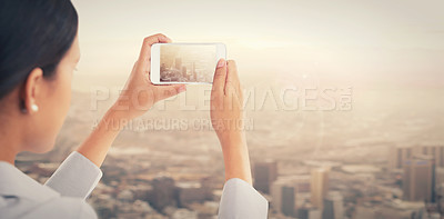 Buy stock photo Phone, photograph and city with a business woman looking at a view outdoor for motivation or inspiration. Mobile, future and back of a female employee taking a picture of an urban town with flare