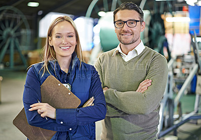 Buy stock photo Portrait, coworkers and managing industrial logistics factory, team and holding clipboard for inventory. Man, woman and together in warehouse for export or distribution, target and stock take.