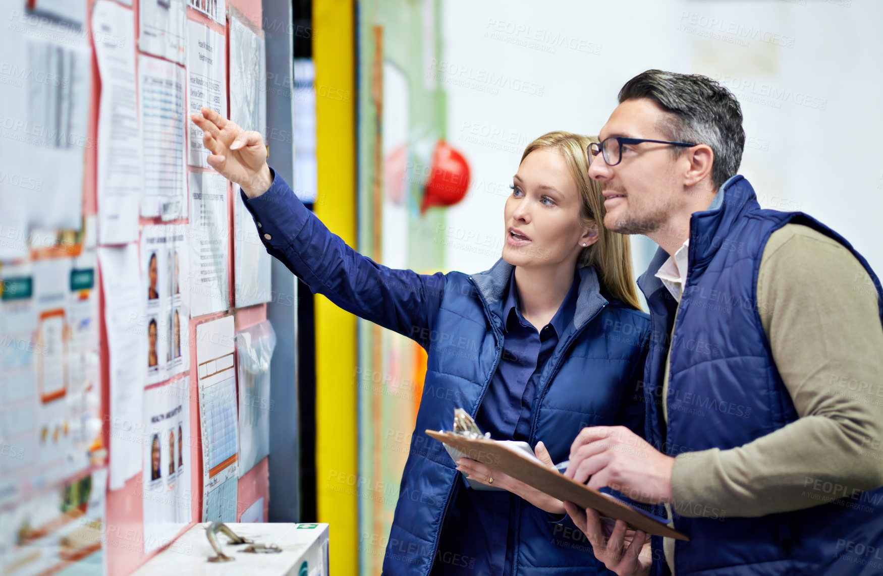Buy stock photo Man, woman and planning schedule with board in warehouse with calendar for order details. Business, people and checking with checklist or clipboard for supplier information and inventory updates