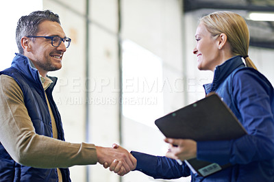 Buy stock photo Business people, handshake and welcome for partnership, collaboration and agreement. Professional, clipboard and shaking hands for introduction, b2b onboarding or teamwork in shipping warehouse