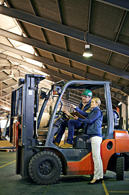 Buy stock photo Discussion, warehouse and workers with forklift working on site, loading on dock with Industrial moving vehicle. Teamwork, together or woman with clipboard for shipping inventory, hardhat for safety