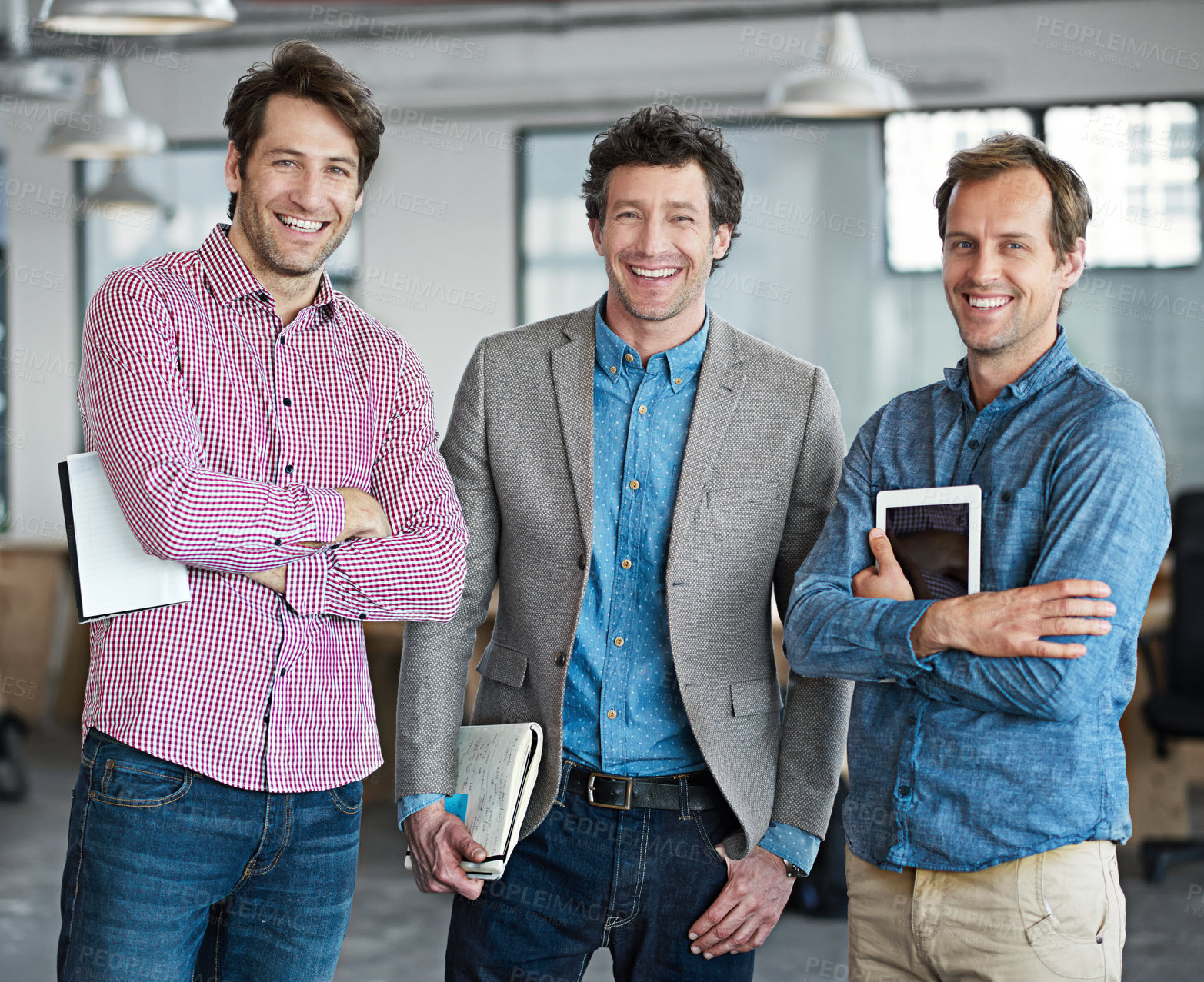 Buy stock photo Smiling, happy and confident business men standing together in an office. Portrait of a male architect group with a smile ready to work. Architecture workers feeling positive about a teamwork project