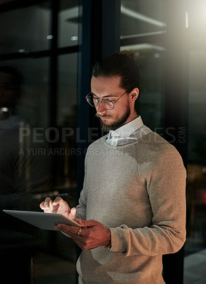 Buy stock photo Tablet, office and business man at night for research, social media and working late on internet. Technology, communication and male worker with digital tech for email, networking and online website