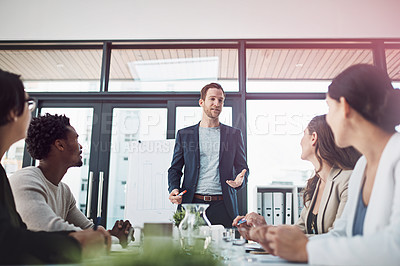 Buy stock photo Boardroom, proposal and man, talking and colleagues of company, listening and presentation for business. Collaboration, teamwork and planning for project by male person and employees and staff