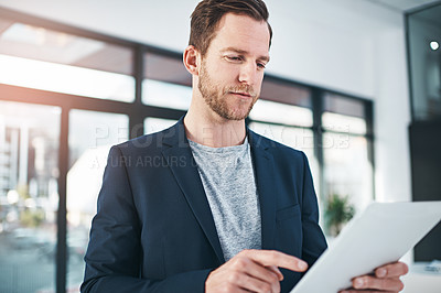 Buy stock photo Businessman, tablet and internet research as tech startup or project planning or game design, digital app or office. Male person, scrolling and finger or programming software, entrepreneur or contact