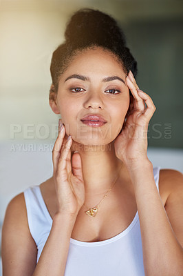 Buy stock photo Mexico woman, portrait and skincare in bathroom at home for routine, cleaning or natural beauty. Female person, smile and confident in restroom with natural glow, shine and touching face in apartment