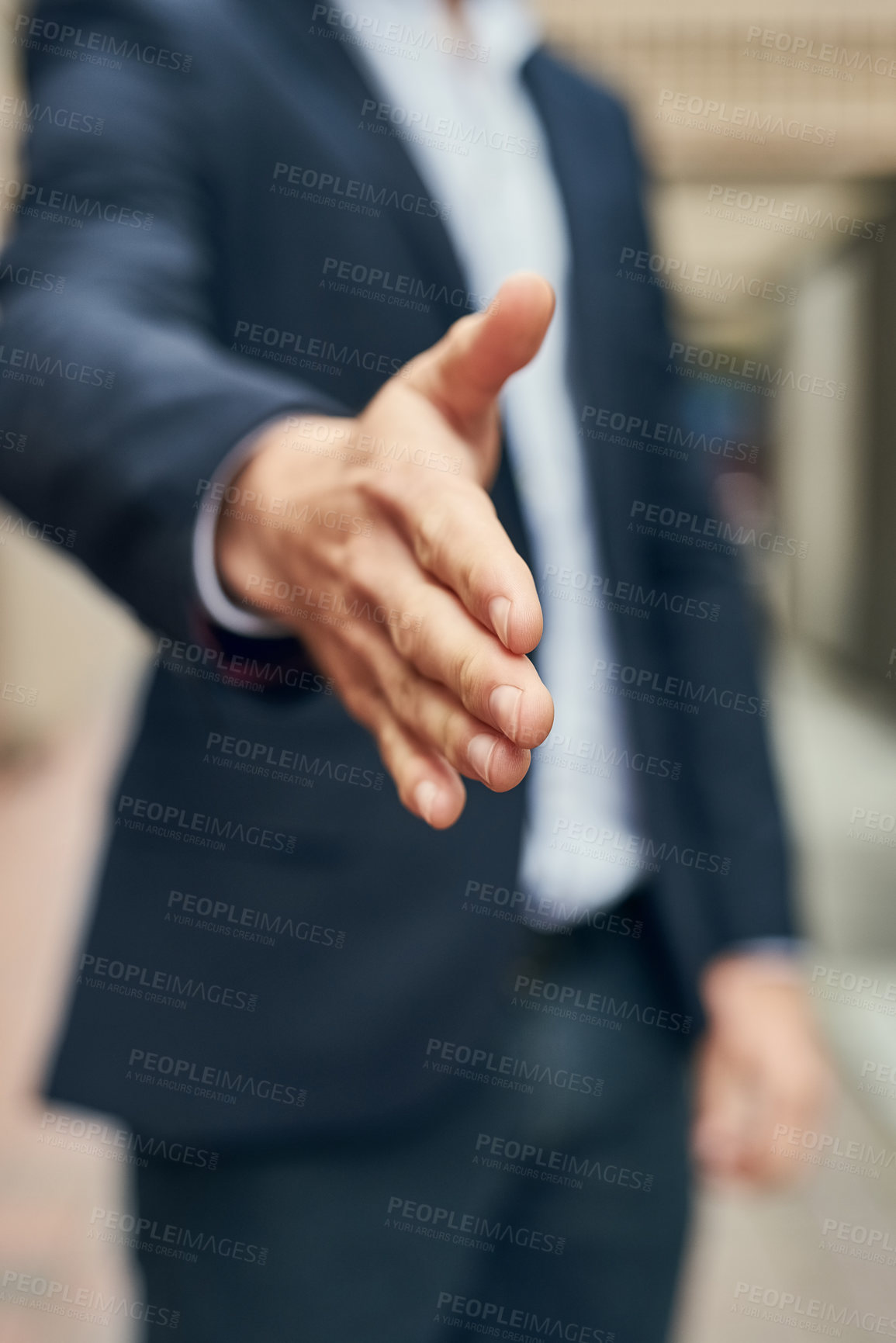 Buy stock photo Closeup shot of an unidentifiable businessman gesturing for a handshake