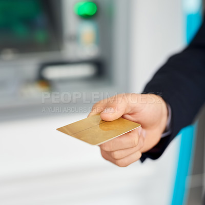 Buy stock photo Closeup shot of an unidentifiable businessman holding out a credit card