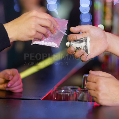 Buy stock photo Closeup shot of a woman buying ecstasy from a dealer in a nightclub