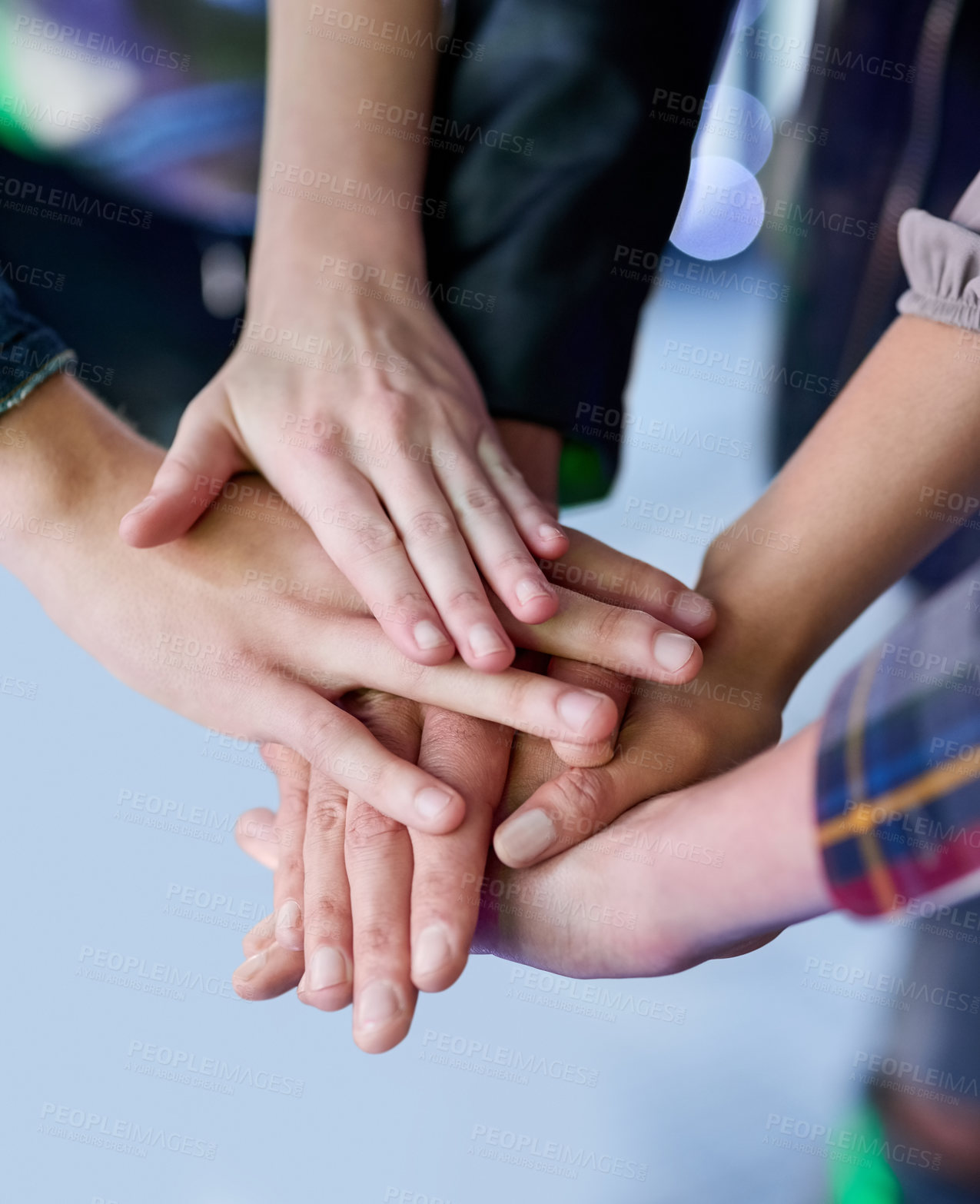 Buy stock photo Shot of a group of unidentifiable friends making a pact by putting their hands in a pile