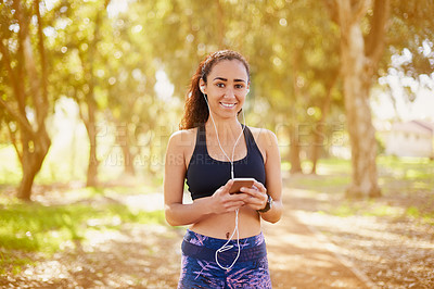 Buy stock photo Black woman, earphones and portrait in park for exercise, sport training and podcast for run. Smartphone, cardio workout and African girl outdoor with listen to radio and audio playlist in Colombia