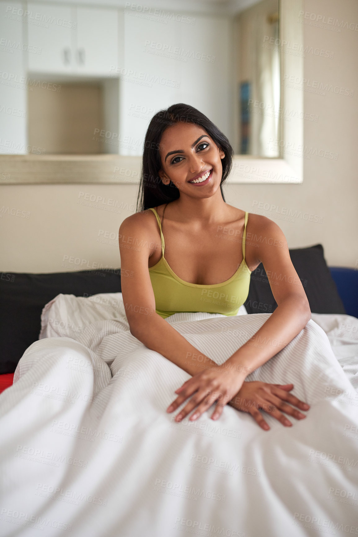 Buy stock photo Shot of a young woman waking up in bed feeling well rested