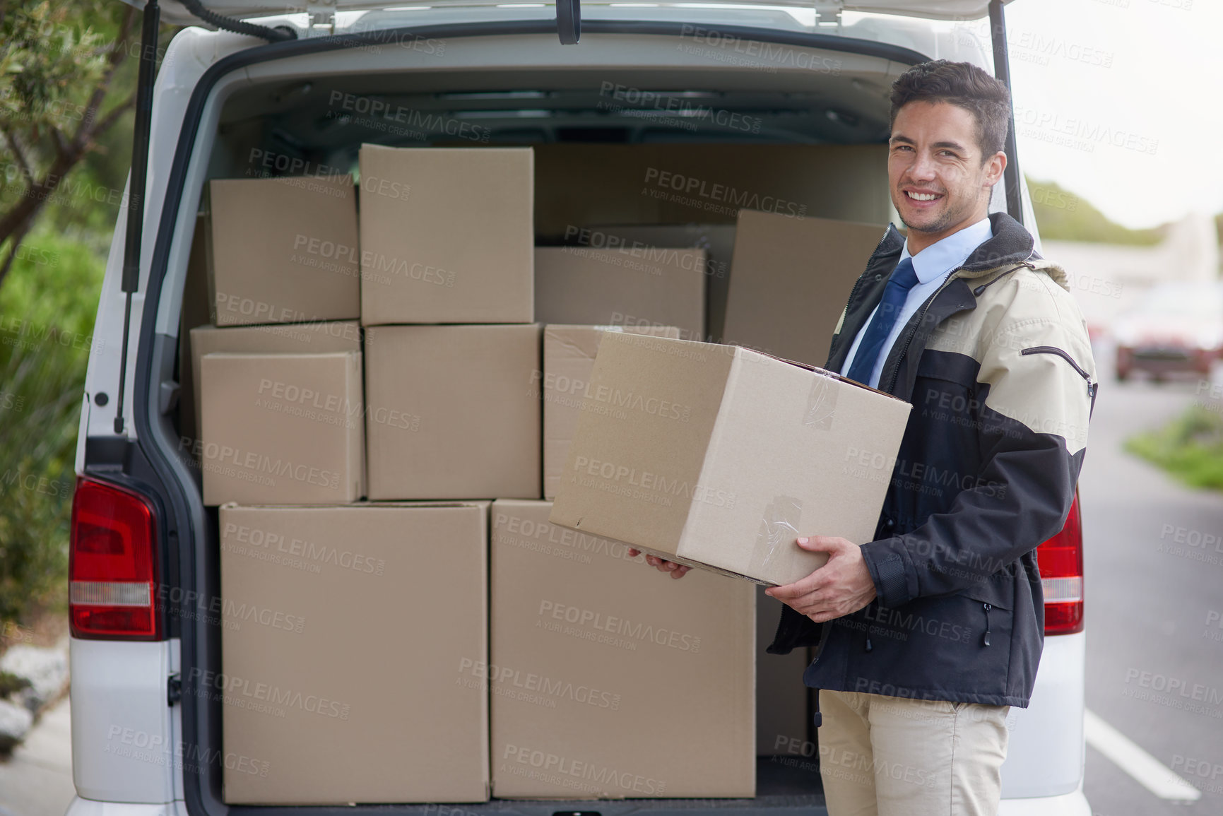 Buy stock photo Portrait, delivery and loading of box by man, smile and truck for logistics in morning and outdoor. Happiness, employee and courier with cardboard, transportation and driver for warehouse and service