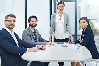 Buy stock photo Portrait of a group of corporate businesspeople meeting in the boardroom