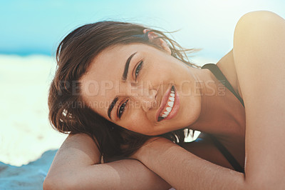Buy stock photo Portrait of a sexy young woman lying on the beach